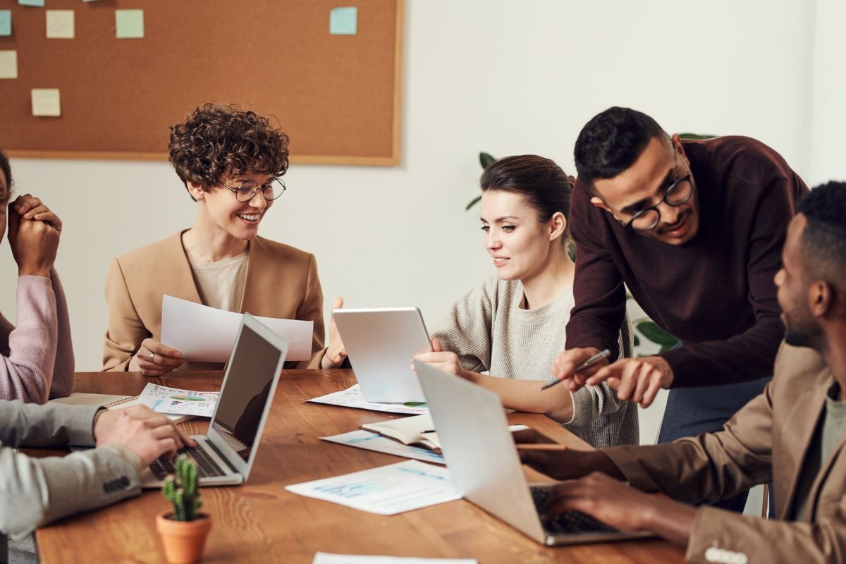 Professionals reviewing documents during a business consultation